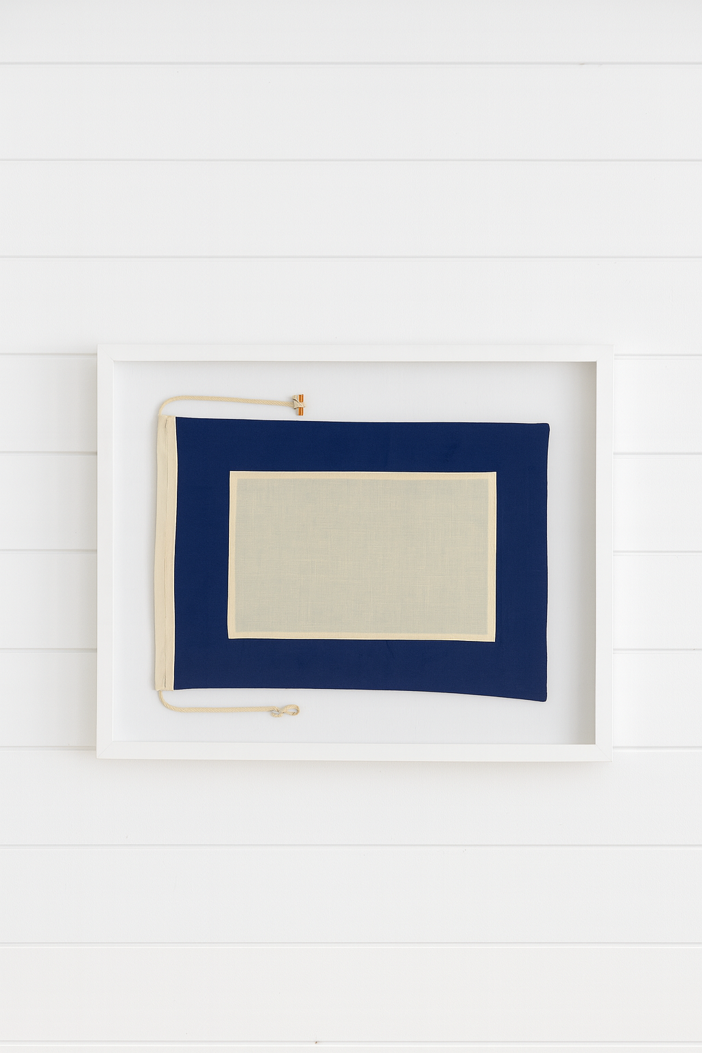 Navy framed papa flag with beige interior on a white background