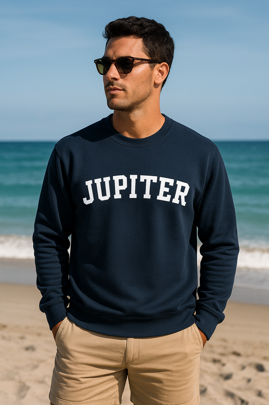 Man wearing a navy blue sweatshirt with JUPITER text on a beach